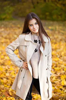Little Girl Prints: Portrait of a beautiful young brunette little girl, autumn park outdoors