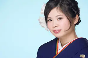 Black Hair Prints: A portrait of a beautiful young Japanese girl in a blue kimono for her coming of age ceremony on her 20th birthday