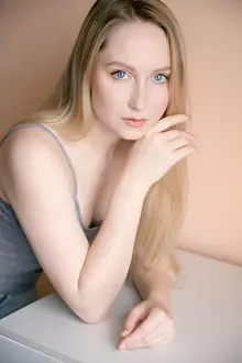 Sensuality Prints: Portrait of a beautiful young woman with blue eyes