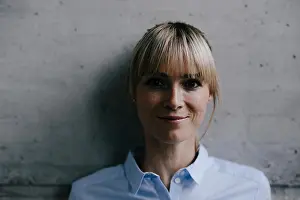 Mid Adults Prints: Portrait of a blond businesswoman, looking confidently