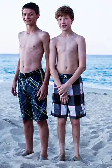 12 13 Years Prints: Portrait of two boys standing on beach
