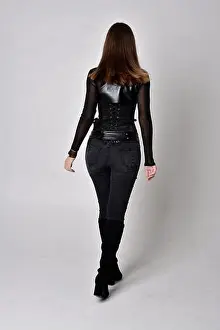 Back View Prints: Portrait of brunette girl wearing black leather catsuit