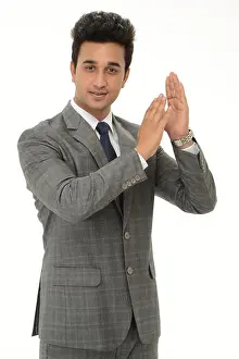 Well Dressed Prints: Portrait of a businessman clapping