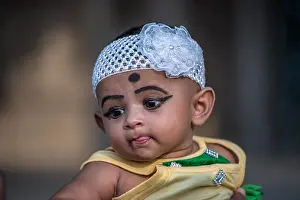 Make Up Prints: Portrait of a child with black kajal on eyes, Delhi, India