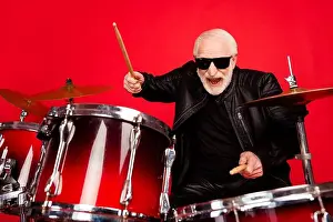 Punk Prints: Portrait of crazy funky old man punk rocker play drum enjoy night club festival recording studio composition wear