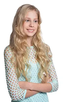 Adorable Prints: Portrait of cute blonde teen girl isolated on white background