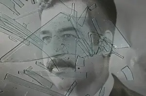 a portrait of deposed iraqi dictator saddam hussein lies in its broken frame inside a government oil company building in kirkuk