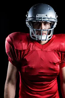 Headwear Prints: Portrait of determined American football player