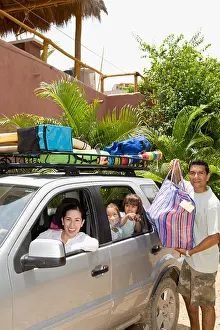 Sibling Prints: Portrait of a family preparing for vacation