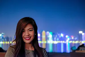 Lipstick Prints: Portrait of a Filipino Girl with the Doha skyline shining in the background