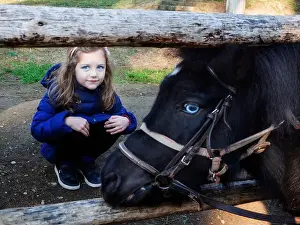 Animal Portrait Prints: Portrait of a girl crouching by a horse