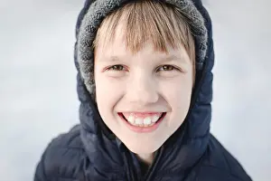Toothy Smile Prints: Portrait of happy boy in winter wear
