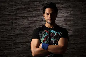 Arms Crossed Prints: Portrait of an Indian young man with his arms crossed