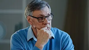 Fatigue Prints: Portrait indoor in office home old thoughtful pensive confused senior man feel worried think memory problem take off