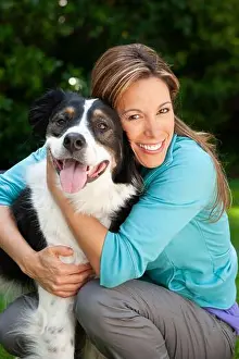 Animal Head Prints: Portrait of middle aged hispanic woman and her dog in backyard