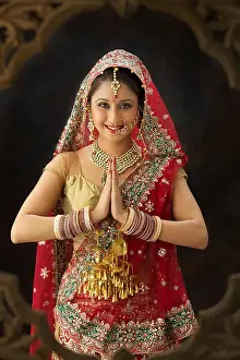 20 24 Years Prints: Portrait of an Punjabi bride welcoming with hands folded