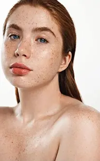 Redhead Prints: Portrait of redhead plus size female model with freckles and blue eyes