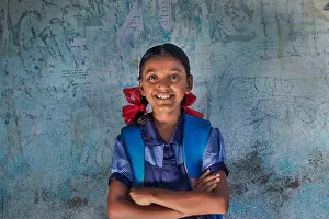 Villager Prints: portrait of a rural school girl Smiling and standing in School