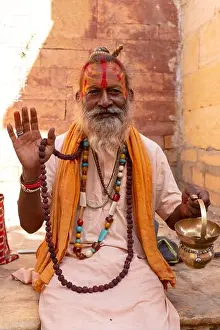 Kumbh Prints: Portrait of Sadhu Baba (Monk) in traditional saffron clothes and beard