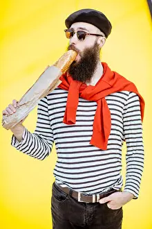 Beret Prints: Portrait of a stylish man dressed in french style with striped shirt