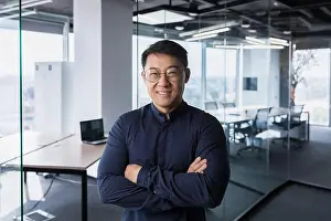 Portrait Professional Prints: Portrait of successful and experienced mature asian businessman