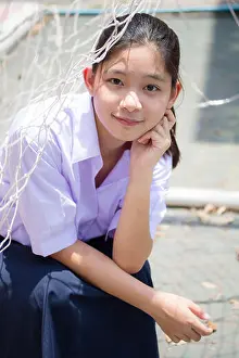 Green Hair Prints: Portrait of thai high school student uniform teen beautiful girl happy and relax