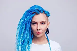 Earrings Prints: Portrait of a woman with blue dreadlocks and a piercing. Informal young woman