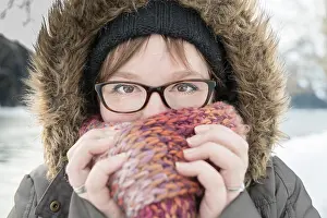Mid Adults Prints: Portrait of woman with scarf in winter