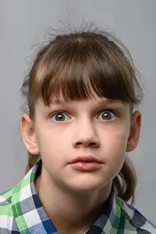Panic Prints: Portrait of ten year old girl in shock with bulging eyes, European appearance, close-up