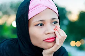 Beautiful Woman Prints: Portrait of young Asian Islamic woman wearing hijab on location, Cebu, Philippines