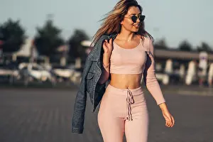 Young Summer Prints: Portrait of Young and Beautiful Woman in Casual Clothes in the Street