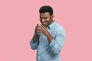 Glance Prints: Portrait of a young devious brunette indian man