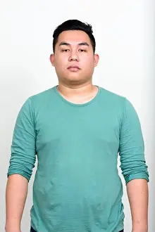 Filipino Prints: Portrait of young handsome overweight Asian man