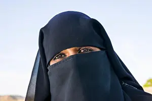 Veil Prints: A portrait of a young muslim woman