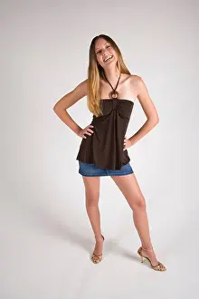 Teenage Girl Prints: Portrait of young stylish woman, studio shot