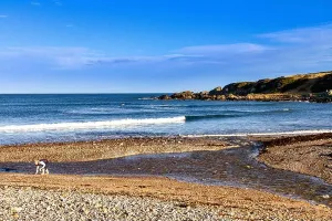Fishing Boats Prints: PORTSOY ABERDEENSHIRE SCOTLAND THE BURN OF DURN AND PEBBLE BEACH PERSON GATHERING SEA SHELLS