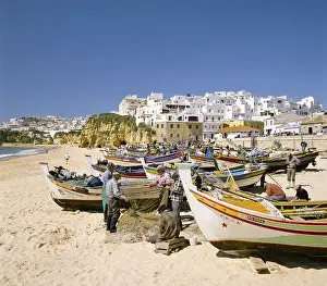 Fisherman Prints: Portugal the Algarve Albufeira fisherman's beach men mending nets