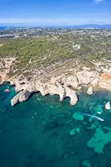 Portugal Algarve beach Praia da Marinha sea ocean drone view aerial photo from above portrait format water