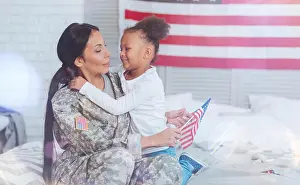 Custody Prints: Positive nice mother and daughter sitting on the bed