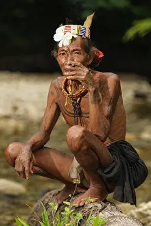 Nomadic Prints: Poto, 60, The indigenous inhabitants ethnic of the islands in Muara Siberut are also known Mentawai tribe