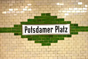 Capitalism Prints: Potsdamer Platz train station sign in berlin germany