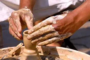 Occupations Prints: Potter making pot of clay at Kala Ghoda art festival 2009 ; Bombay Mumbai ; Maharashtra ; India