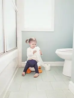 Airy Prints: Potty training 2 year old toddler girl sitting on potty playing with toilet paper roll
