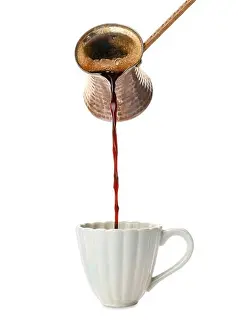 Aromatherapy Prints: Pouring hot coffee from cezve into cup on white background