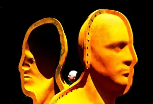 Dreamlike Prints: Powerful modern Janus sculpture of iron man with two faces
