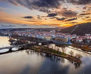 River Drone Prints: Prague, Czech Republic - Aerial panoramic drone view of Strelecky Island with a beautiful winter sunset