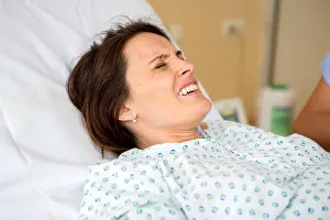 Scramble Prints: Pregnant woman in delivery room, having contractions