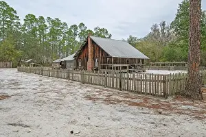 Wooden Fence Prints: Preserved Swamper Homestead Cabin on Chesser Island in Okefenokee National Wildllfe Refuge in Georgia