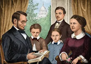 Washington Dc Prints: President Abraham Lincoln and his family reading a book in the White House