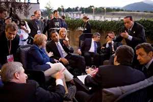 Barack Obama Prints: President Barack Obama confers with world leaders